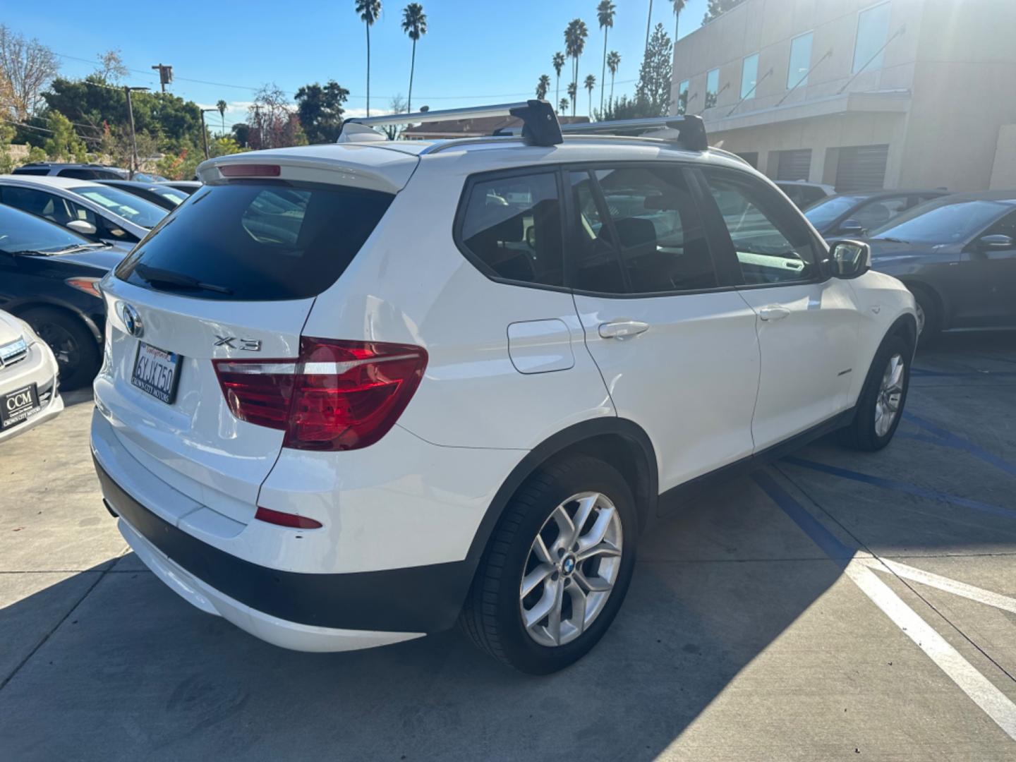 2013 WHITE BMW X3 xDrive28i (5UXWX9C52D0) with an 3.0L L6 DOHC 24V engine, 8-Speed Automatic transmission, located at 30 S. Berkeley Avenue, Pasadena, CA, 91107, (626) 248-7567, 34.145447, -118.109398 - Crown City Motors is a used “Buy Here Pay Here” car dealer in Pasadena CA. “Buy Here Pay Here” financing, means that when you purchase your vehicle from our dealership, that you make the payments to the dealership as well. We do not need the banks approval to get you approved for a used auto - Photo#3